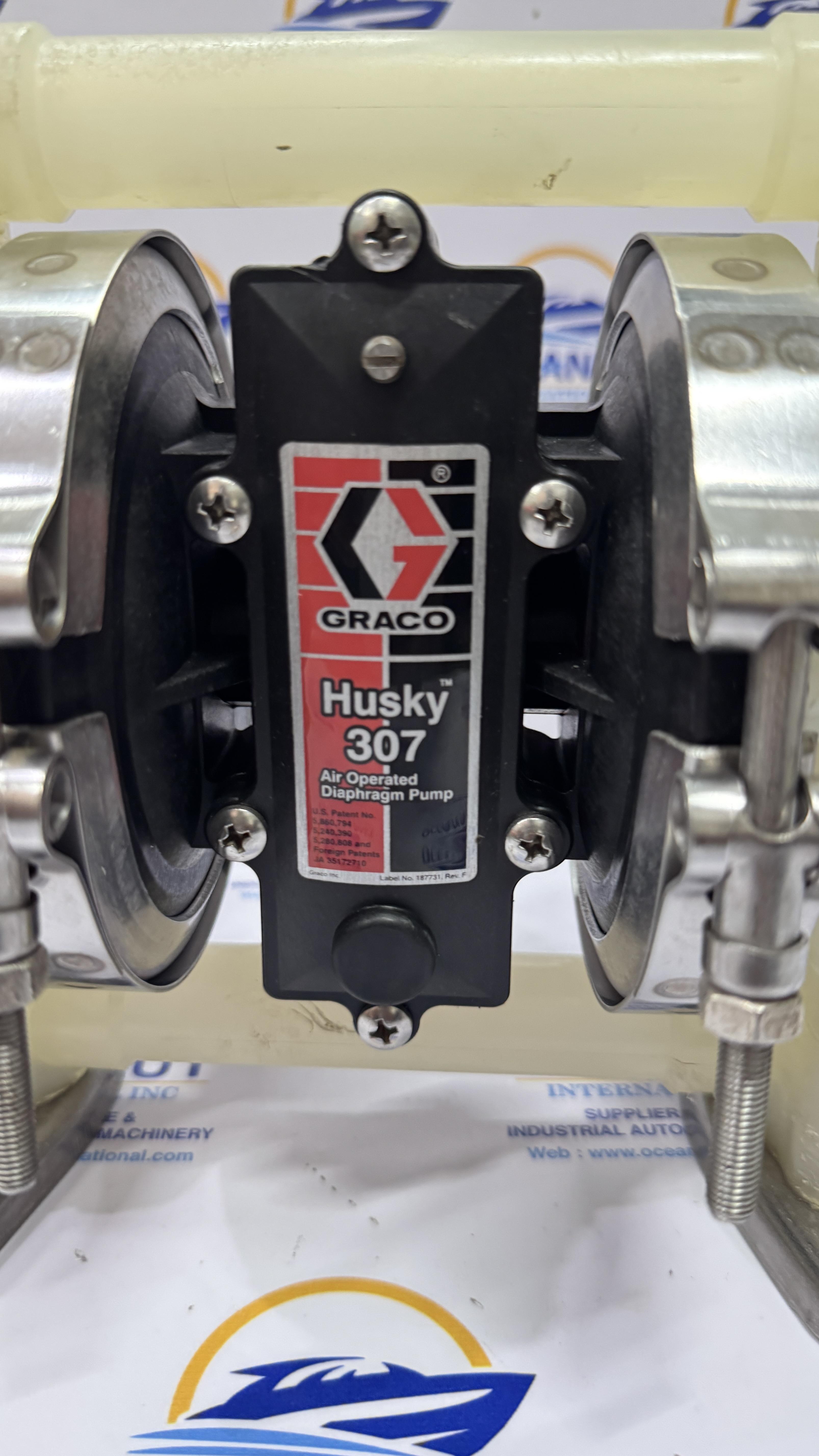 GRACO HUSKY 307 D32977 MAX GPM-l/MIN 7-27 MAX FLUID & AIR PSI 100-7 USA